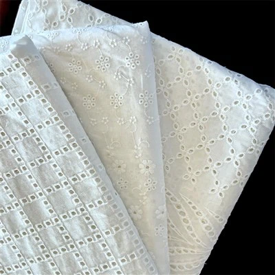 Tela de brodat 100% cotó amb forats