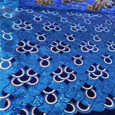 Tela de vestit de núvia africà amb lluentons brodades